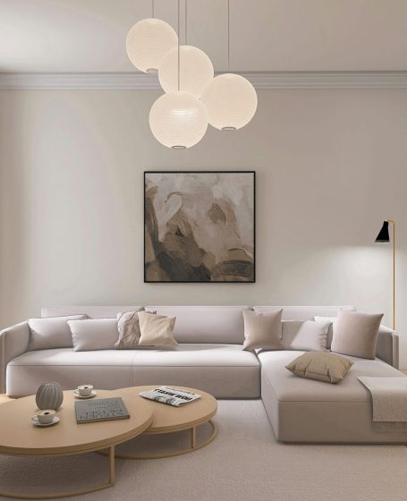 Elegant minimalist living room with neutral colors and modern decor.